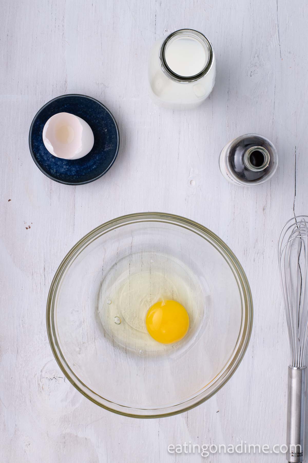 Separate mixing bowl with egg. 