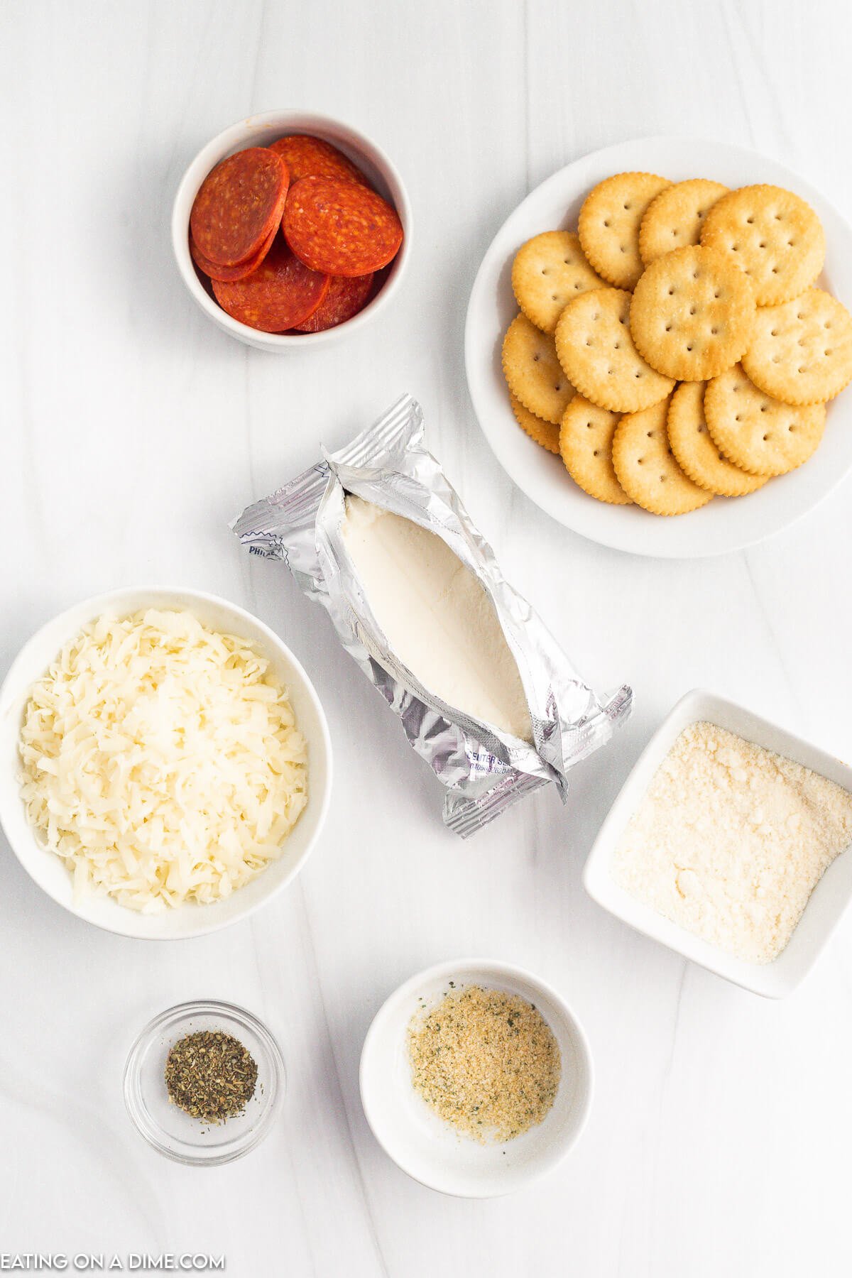 Pepperoni Cheese Ball Ingredients - cream cheese, mozzarella cheese, garlic salt, Italian Seasoning, Pepperoni, Ritz Crackers, Parmesan Cheese