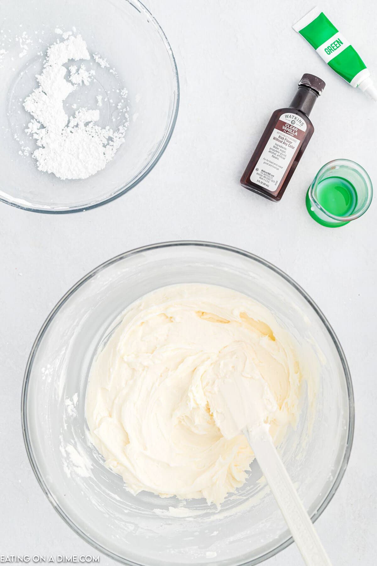 Vanilla and milk combined into mixture for frosting. 
