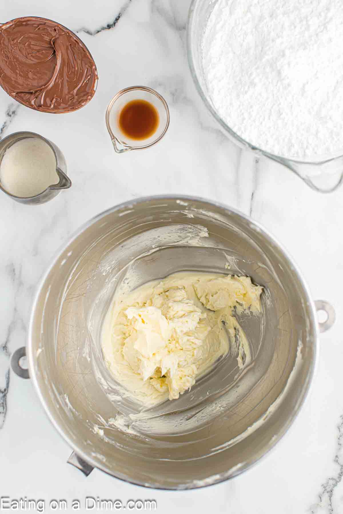 Beating butter in a stand mixer bowl