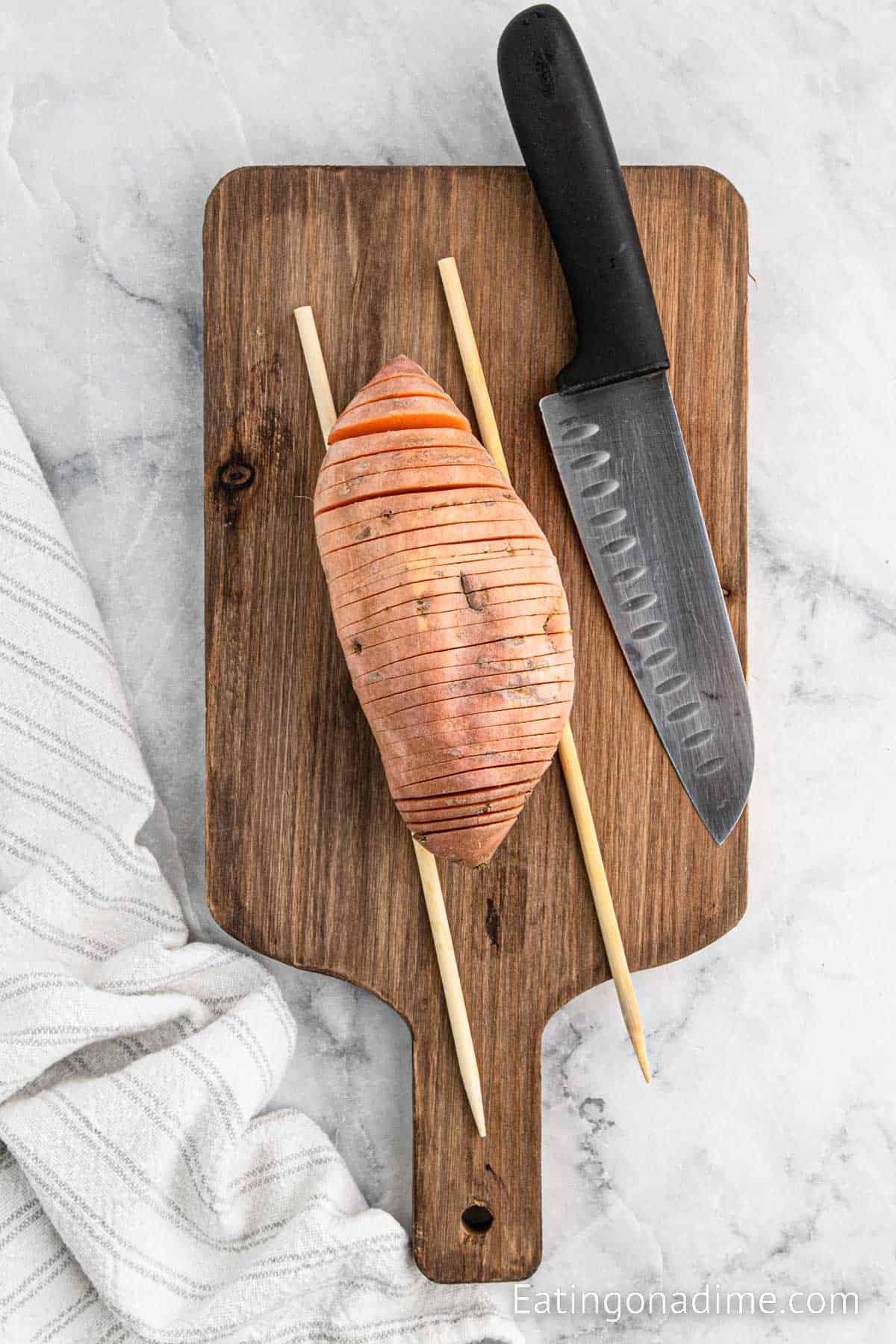 Sliced Sweet Potatoes on a cutting board