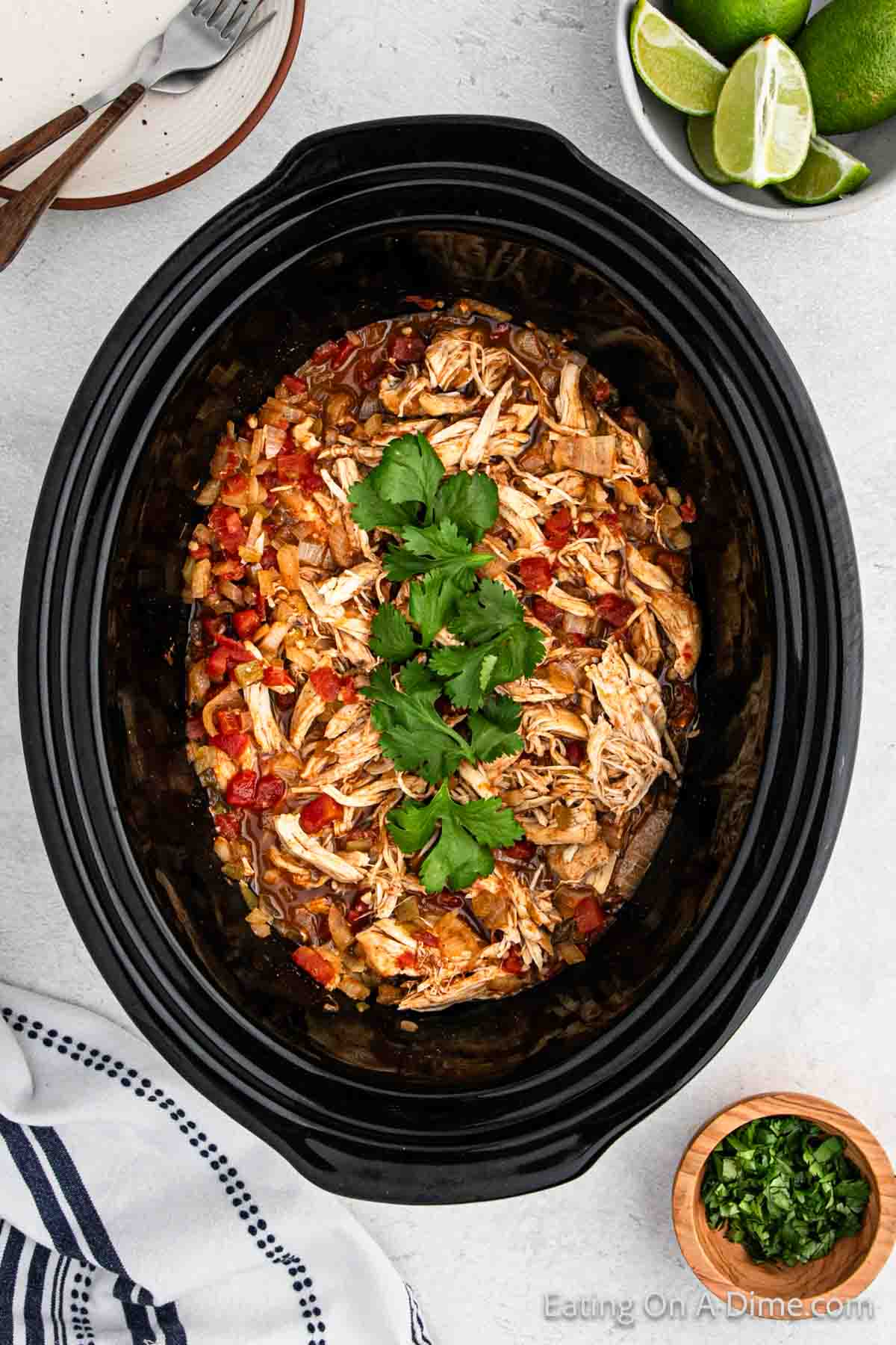 Mexican Chicken in the slow cooker topped with fresh cilantro