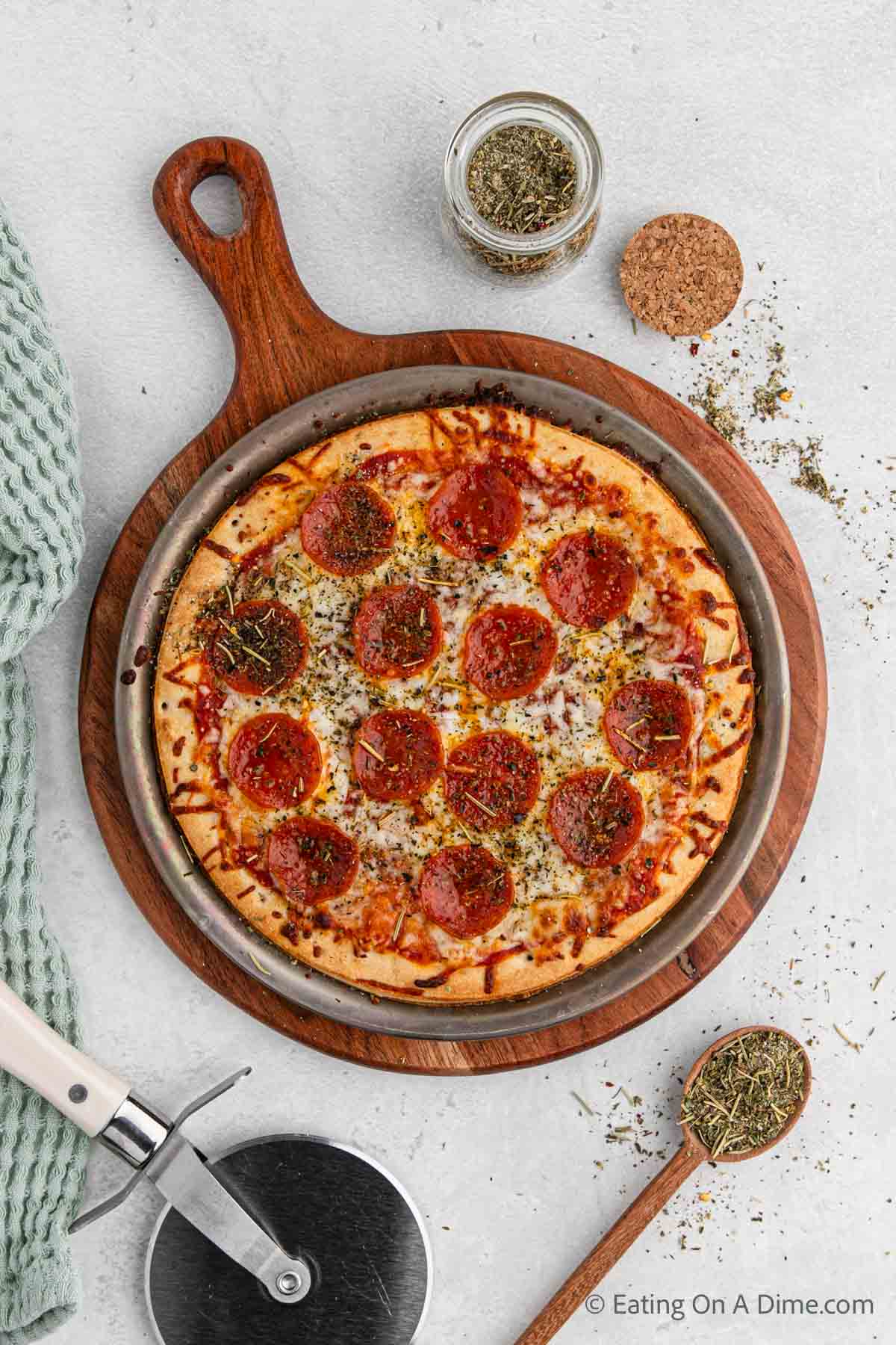 Close up image of Homemade Pizza on a pizza board 