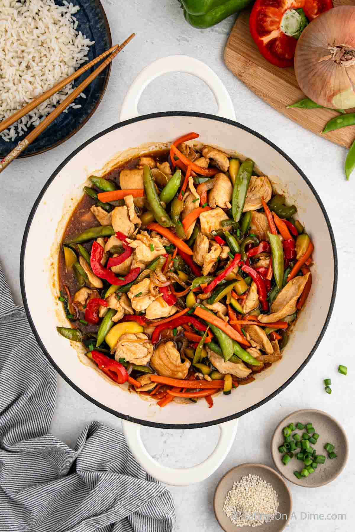 Teriyaki Chicken with veggies in a large pot 