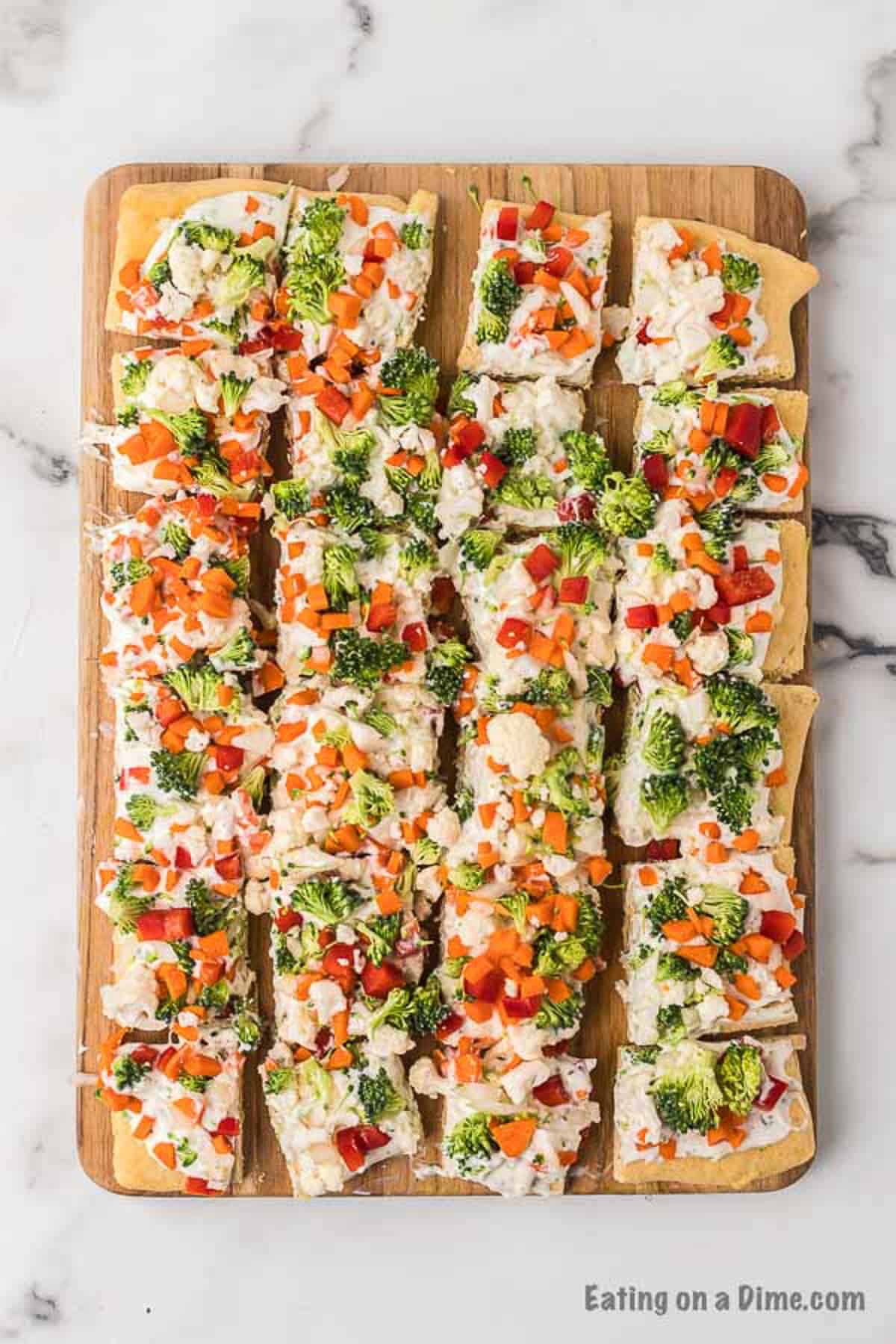 veggie pizza cut into slices