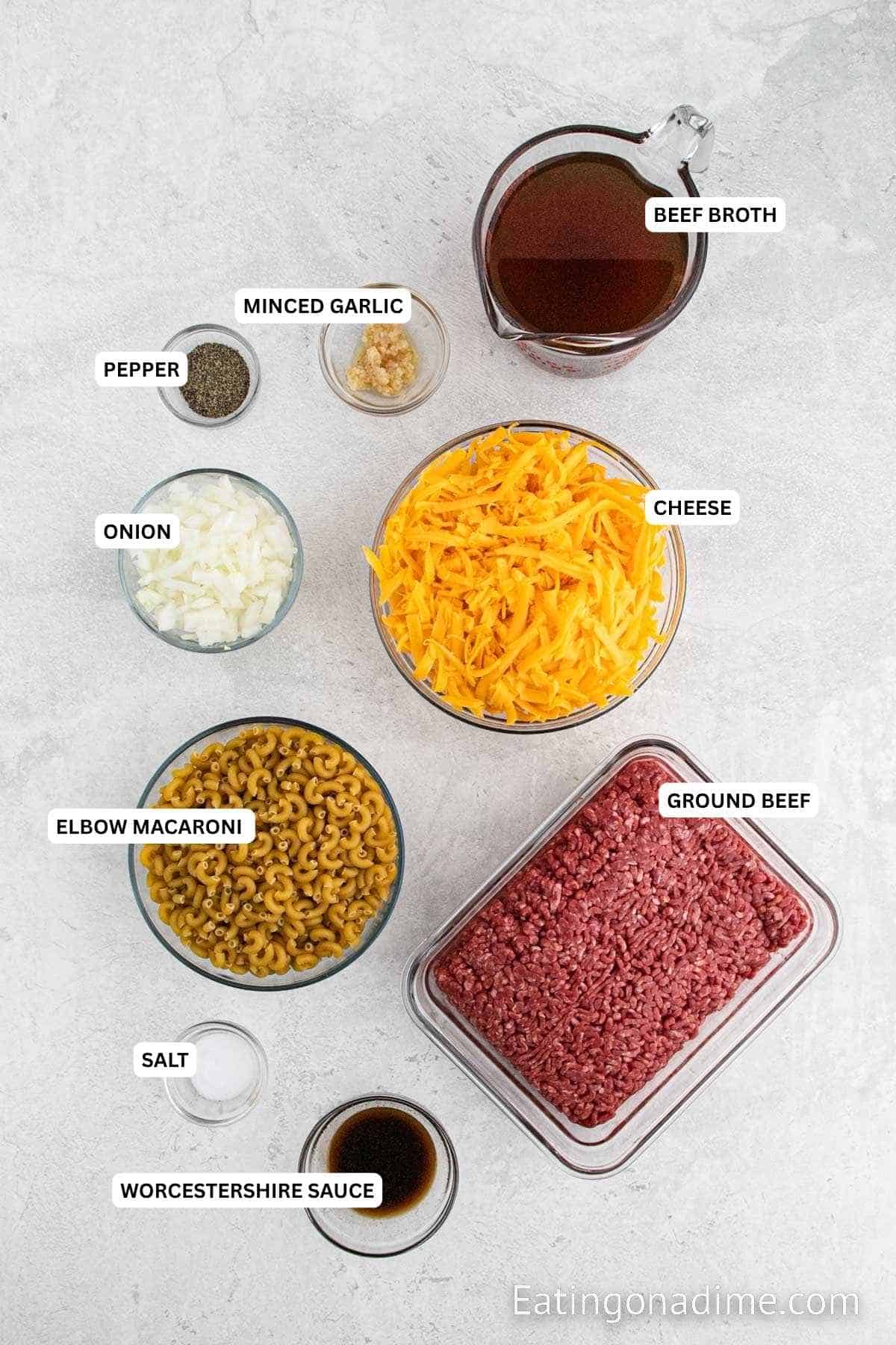 Ingredients for recipe: beef broth, minced garlic, salt, pepper, cheese, onion, pasta and ground beef.