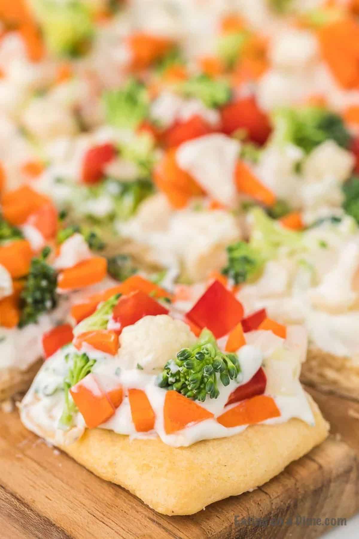 close up photo of veggie pizza slices