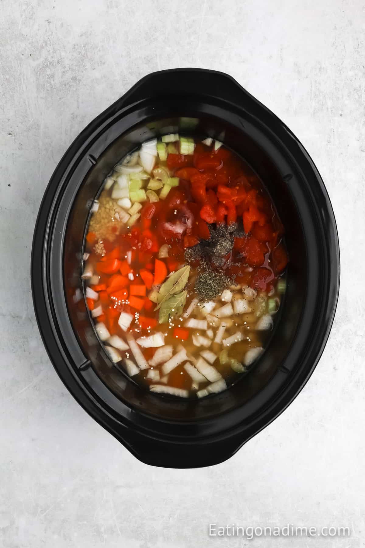 Adding the ingredients to the slow cooker