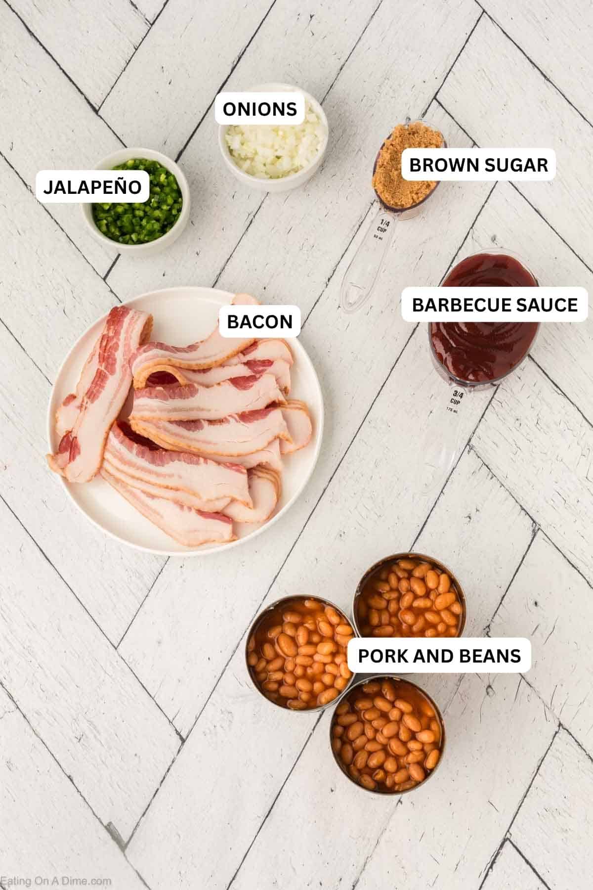 Ingredients for recipe: pork and beans, bacon, barbecue sauce, onions, brown sugar and barbecue sauce.