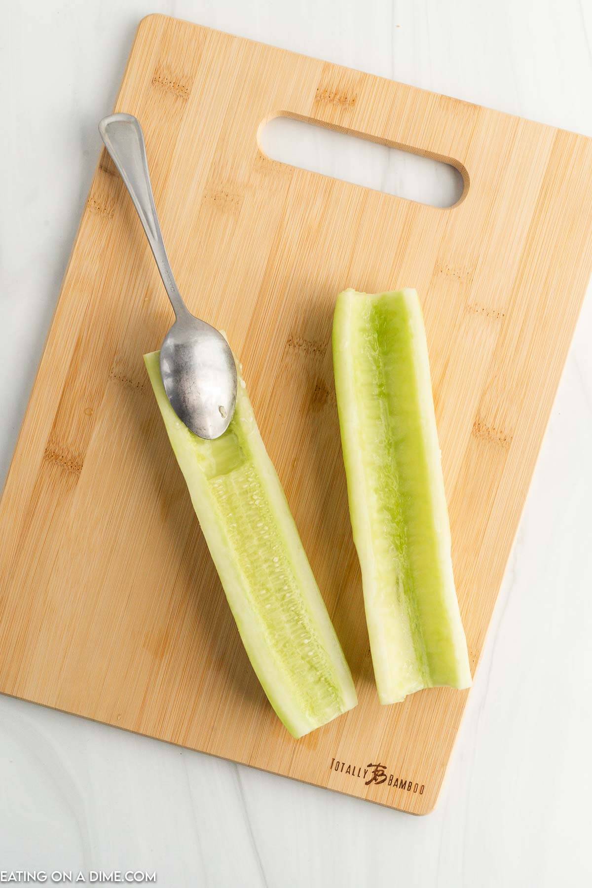 Peel and remove seeds from cucumber
