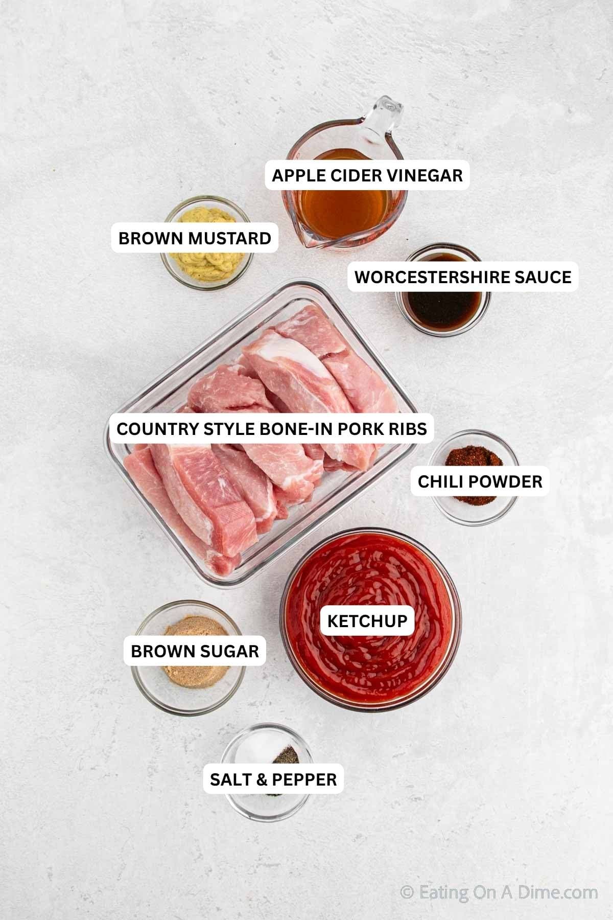 Ingredients for recipe: apple cider vinegar, brown mustard, Worcestershire sauce, pork ribs, chili powder, ketchup, brown sugar, salt and pepper.
