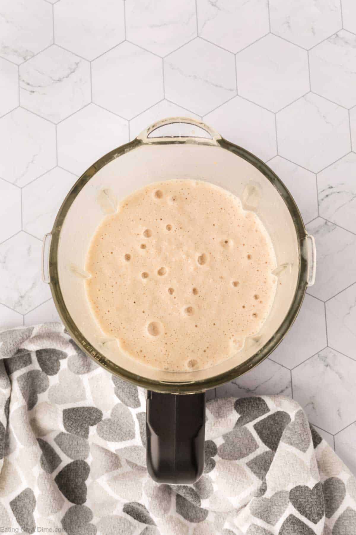 Smooth and creamy smoothie in a blender