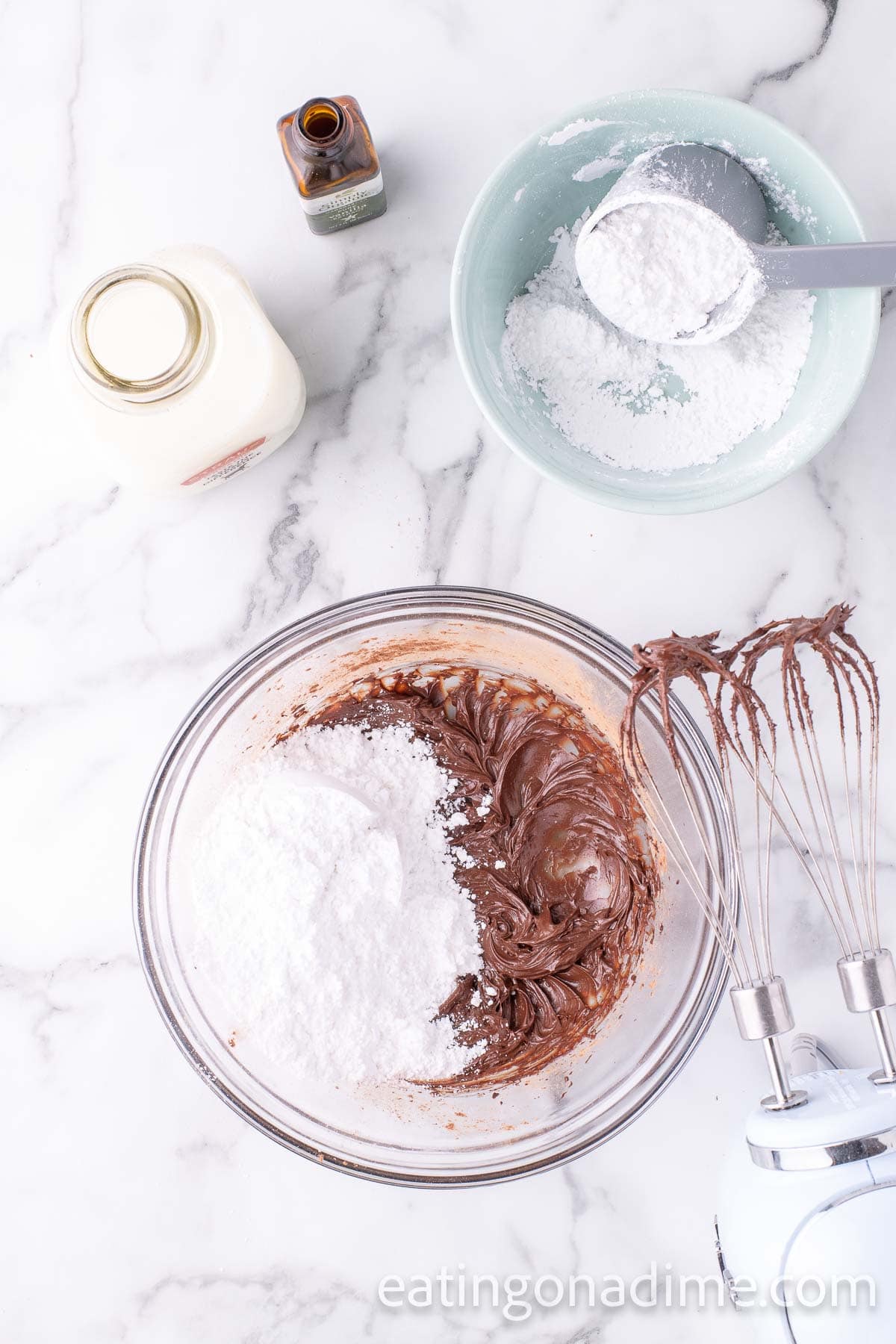 Mixing in powdered sugar into the cocoa powdered mixture
