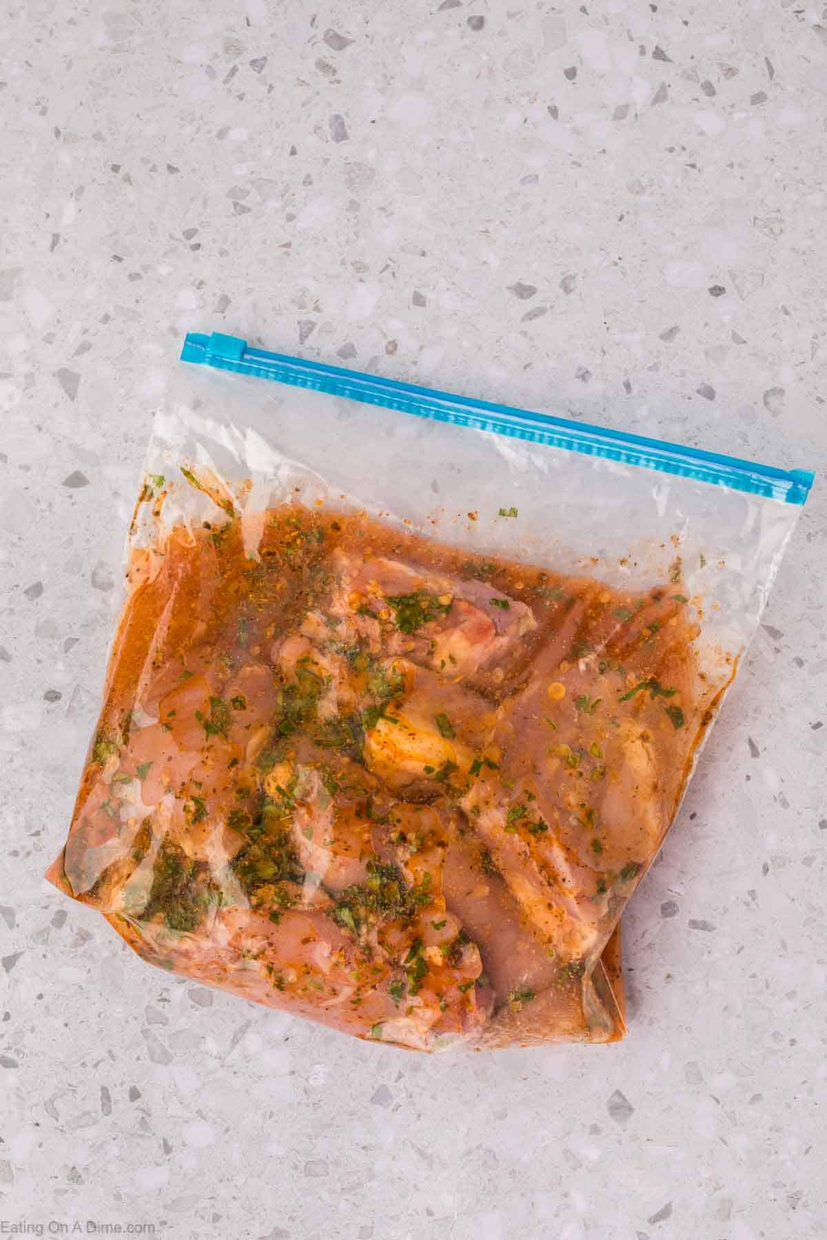 Marinating the chicken thighs in a zip lock bag