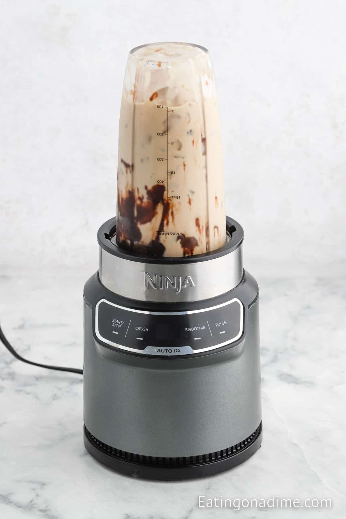 Blending the Frappuccino ingredients in a blender