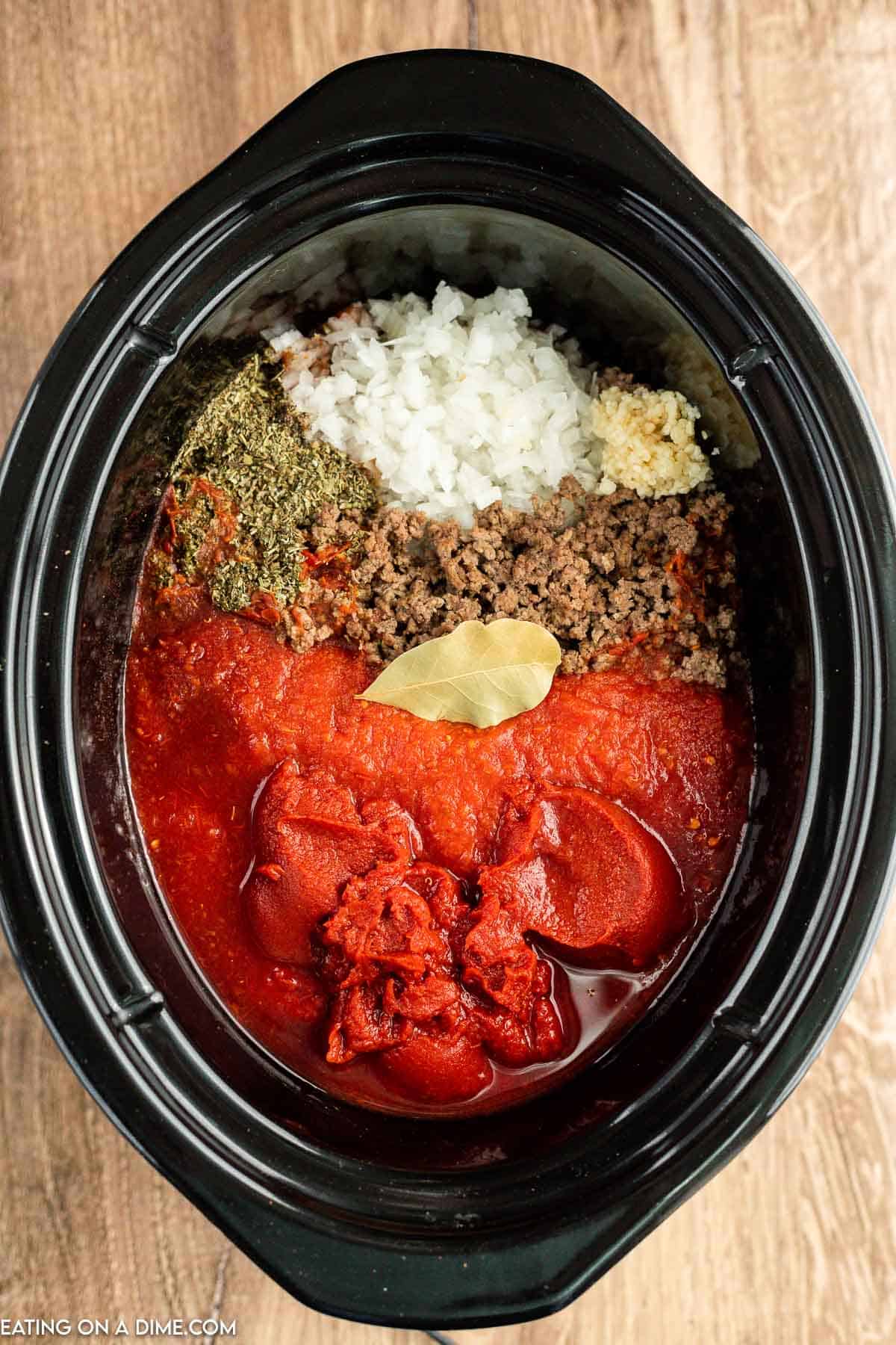 Adding the sauce ingredients in the slow cooker