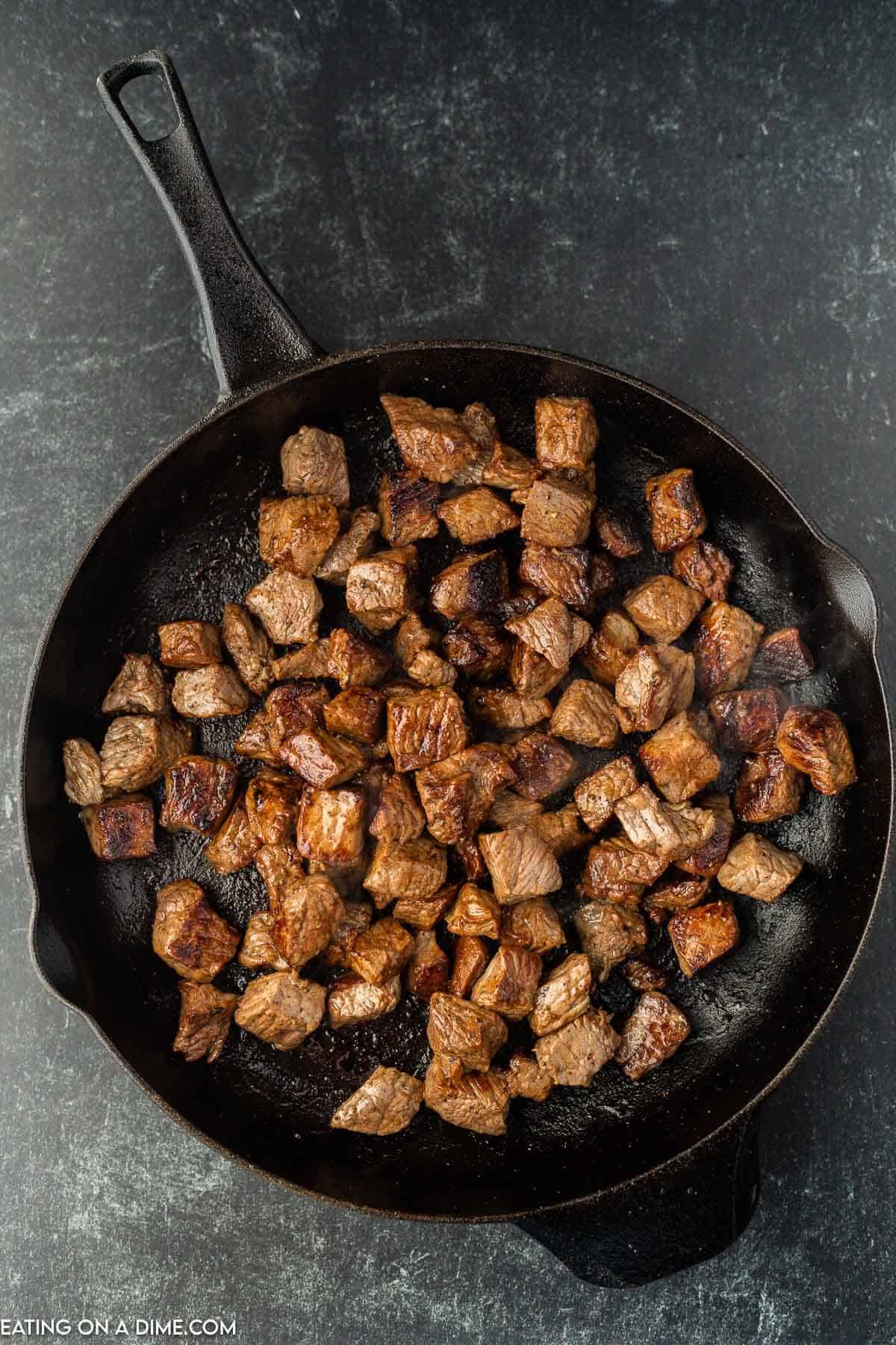 Cooked steak bites in skillet