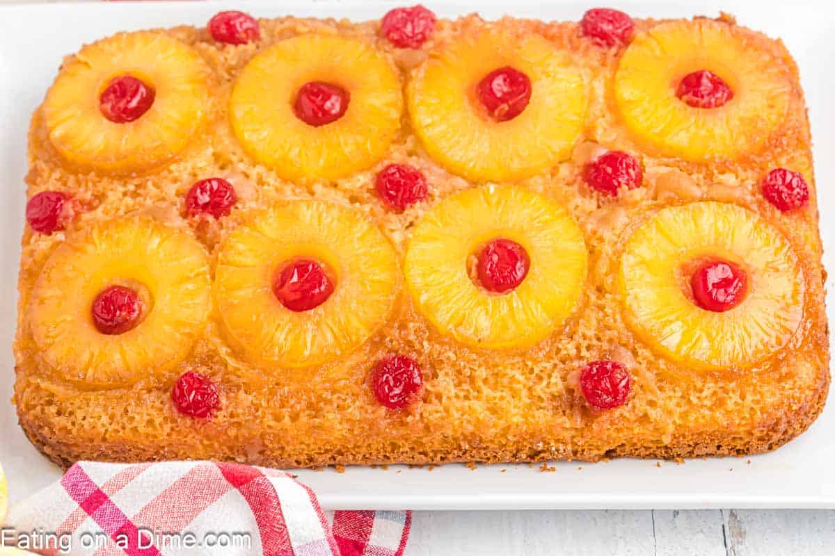 Pineapple Upside Down Cake topped with pineapple rings and cherries. 