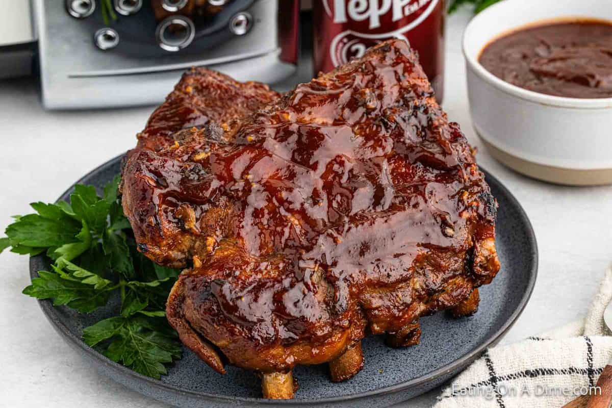 A slab of BBQ Ribs on a plate