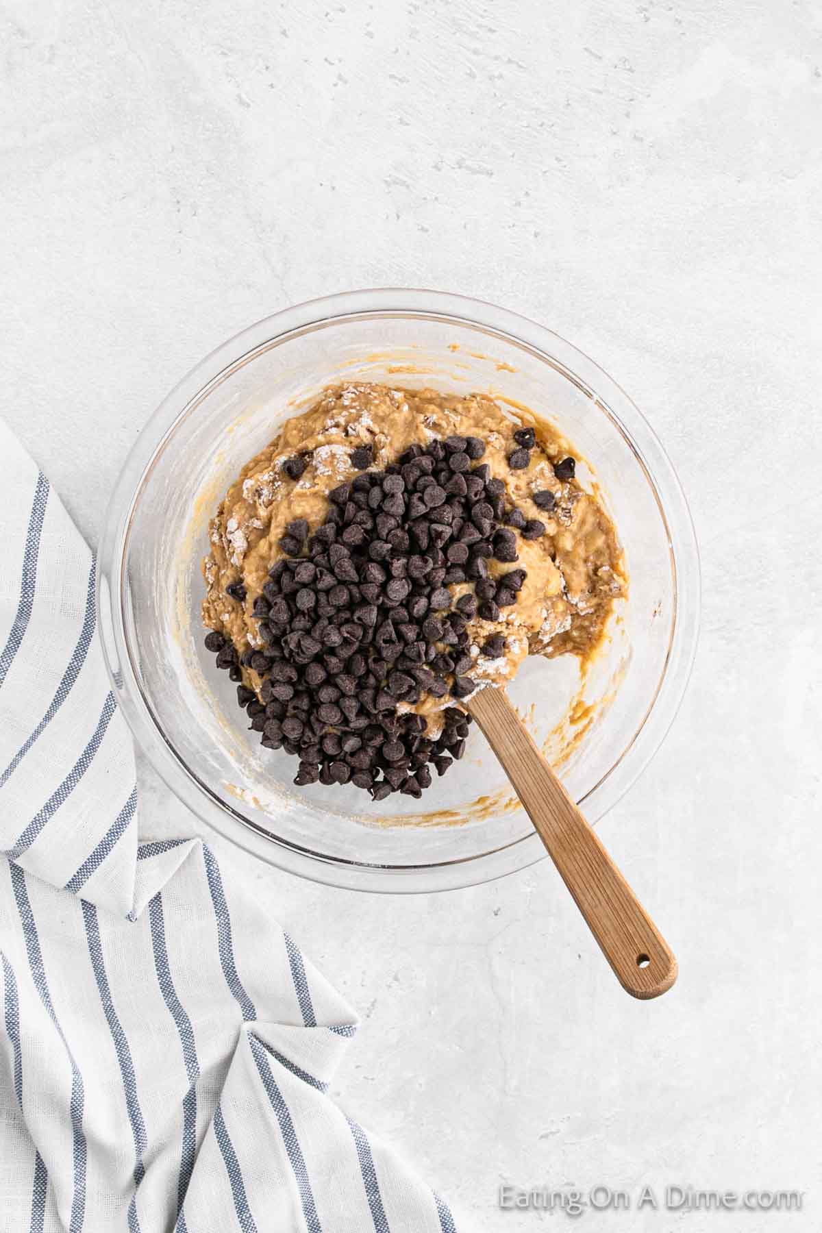 Chocolate chips mixed into the muffin batter