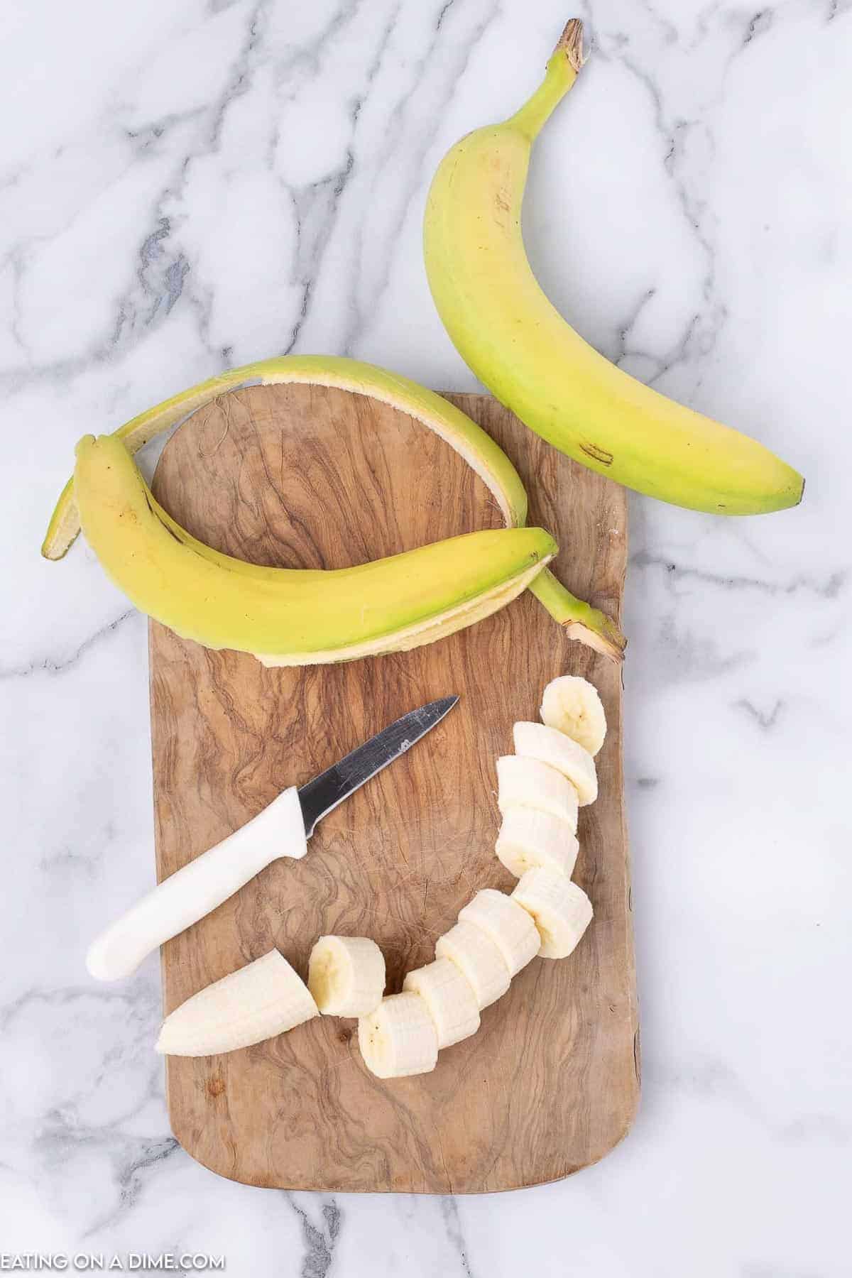 Slice bananas on a cutting board