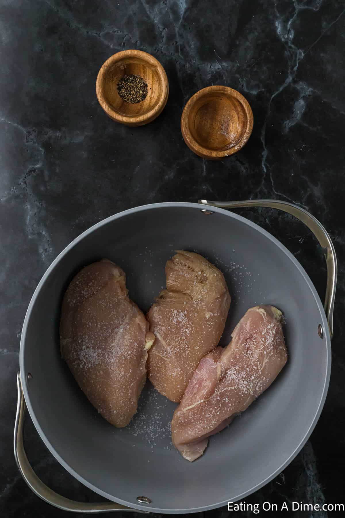 Place chicken in a large pot and seasoned with salt and pepper