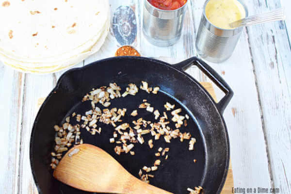 Brown chopped onions in a cast iron skillet with a wooden spoon