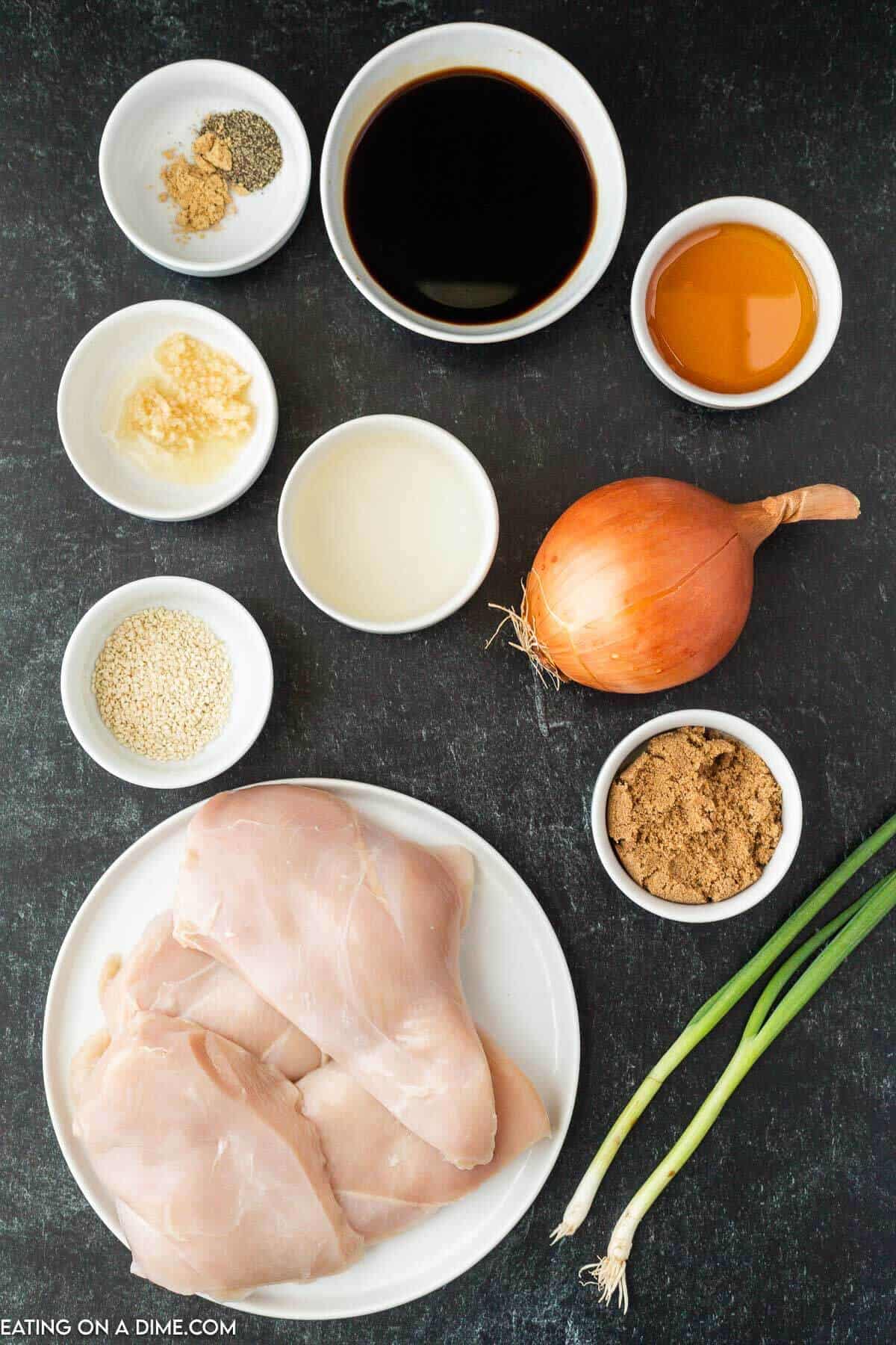 Chicken Teriyaki Ingredients - chicken, onion, brown sugar, soy sauce, rice wine vinegar, honey, garlic, ginger, pepper, sesame seeds, green onion