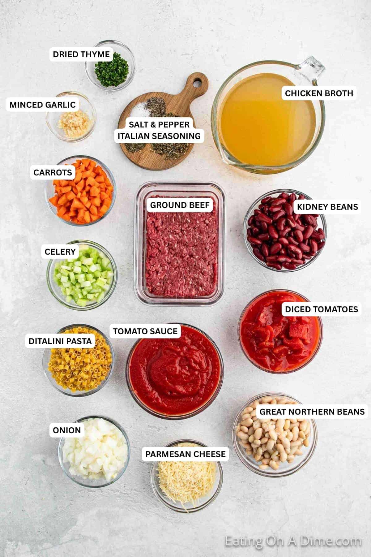 Ingredients for recipe: dried thyme, minced garlic, salt,, pepper, Italian seasoning, chicken broth, carrots, ground beef, kidney beans, celery, pasta, tomato sauce, diced tomatoes, onion, parmesan cheeses and great northern beans.
