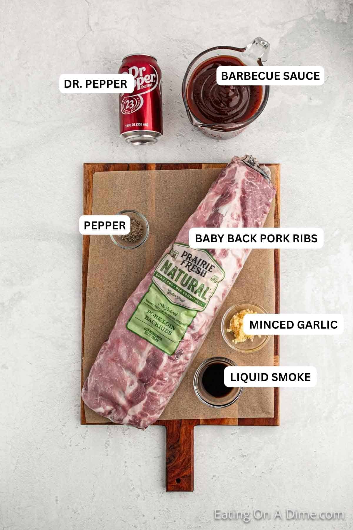 Ingredients for recipe: liquid smoke, minced garlic, ribs, pepper, Dr. Pepper and barbecue sauce.