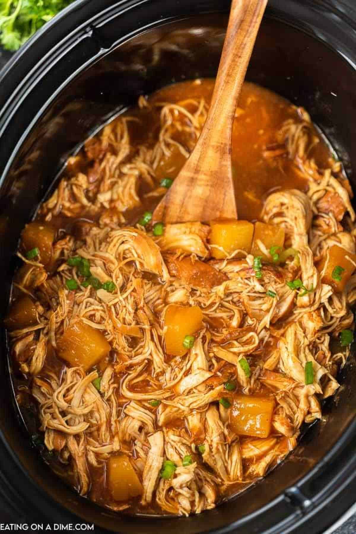 Hawaiian BBQ Chicken in a black crock pot 