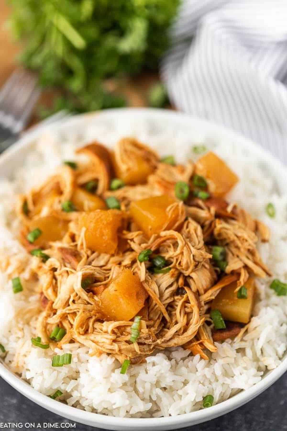 Hawaiian BBQ Chicken over rice in a white bowl 