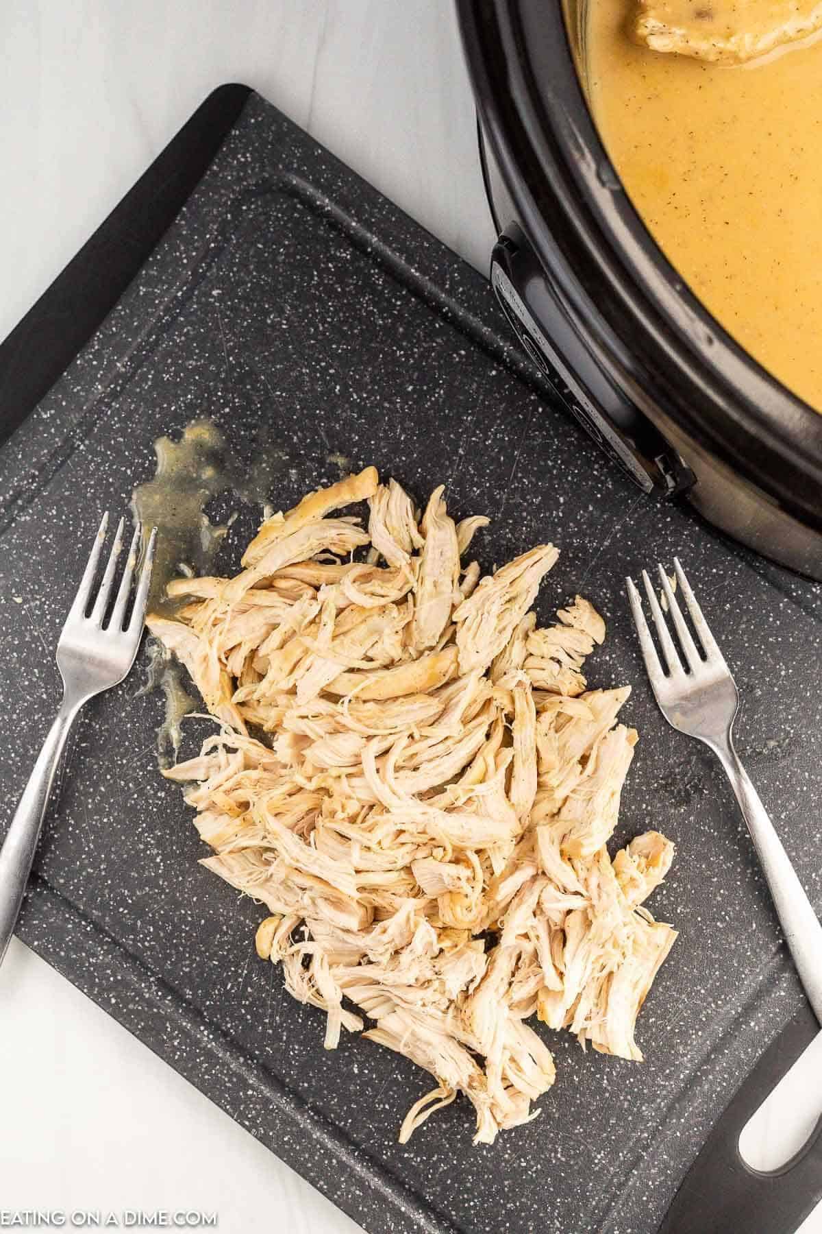 Shredded chicken on the cutting board