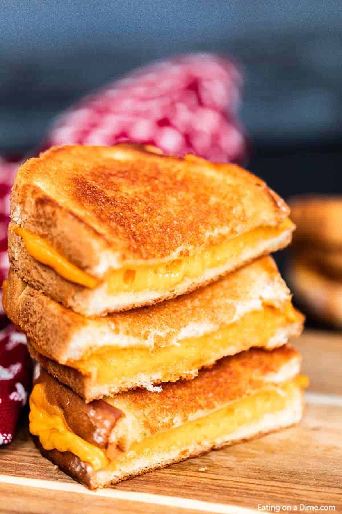 Grilled cheese cut in half and stacked