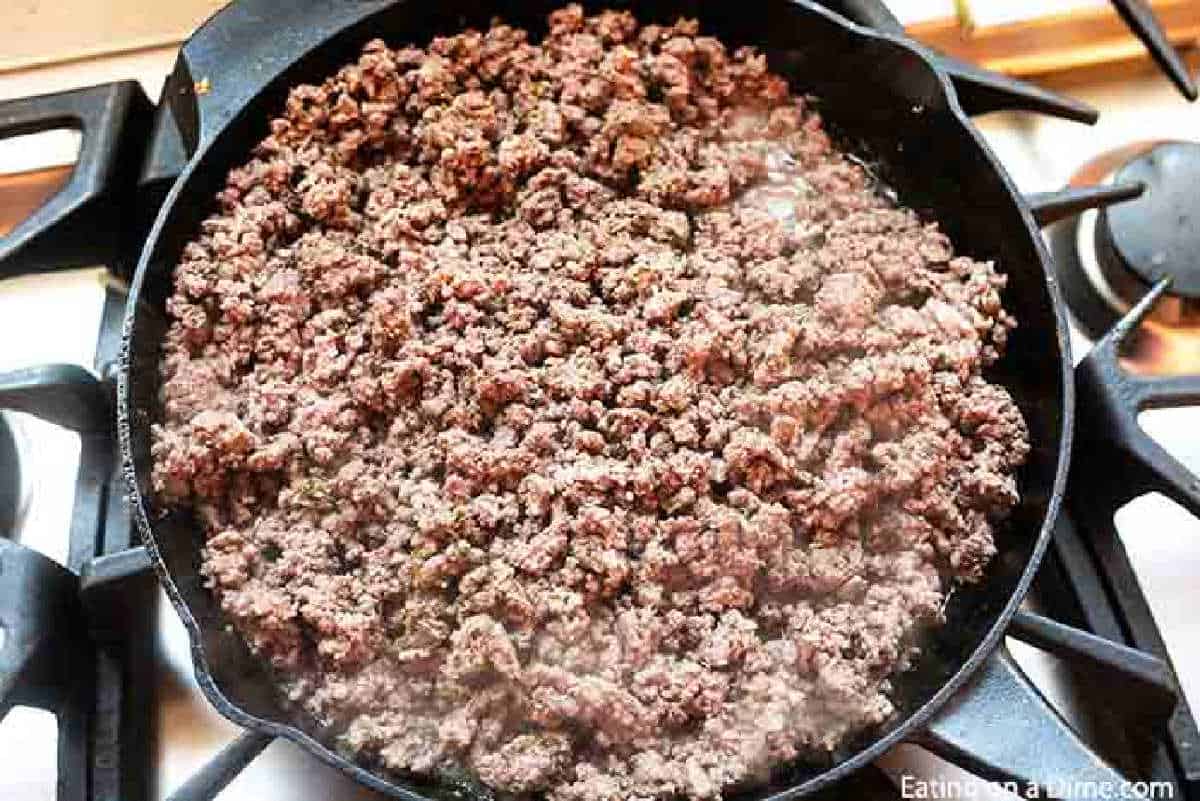 Cooking ground beef in a cast iron skillet on the stovetop