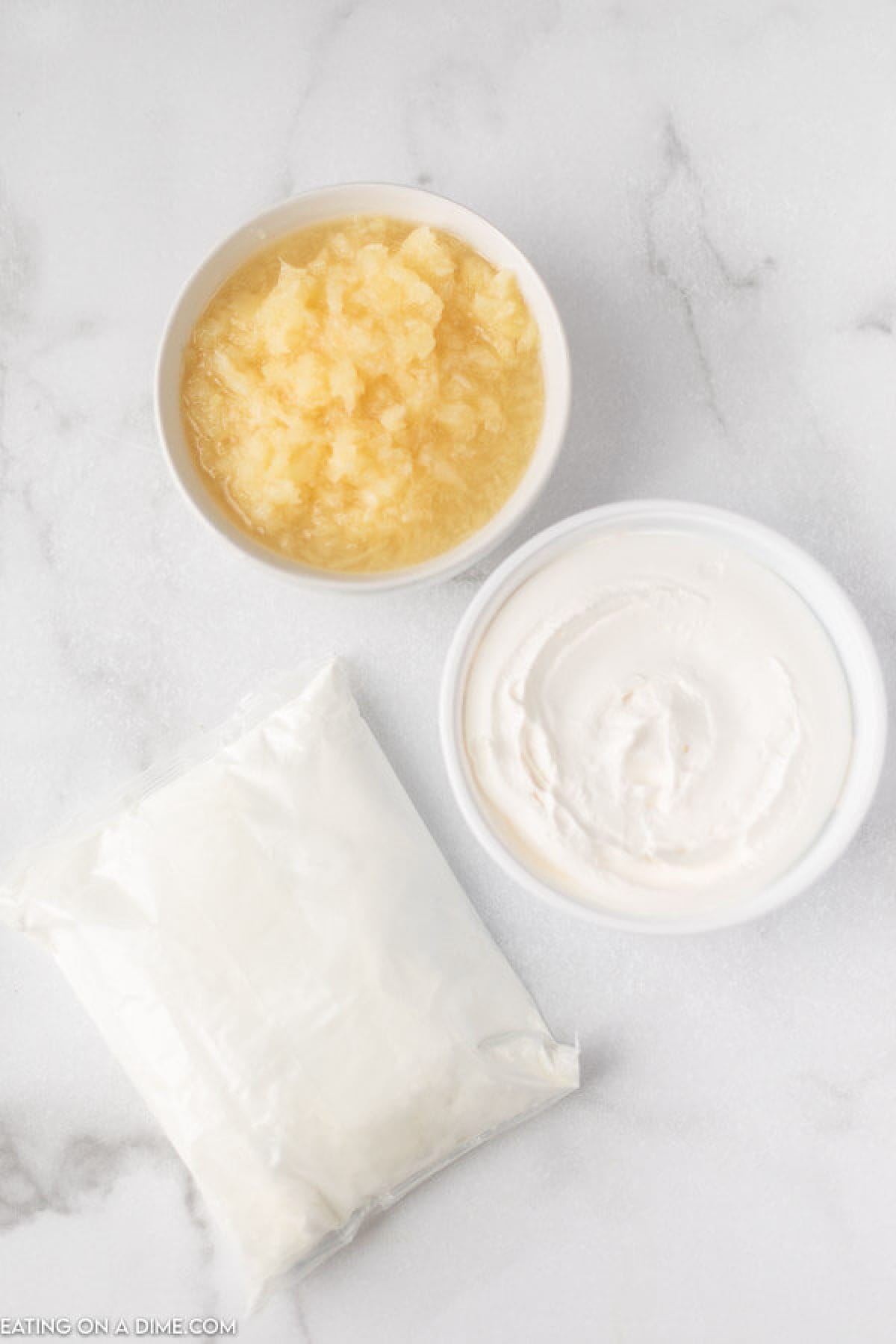 ingredients for pineapple angel food cake - crushed pineapple, cool whip and angel food cake mix