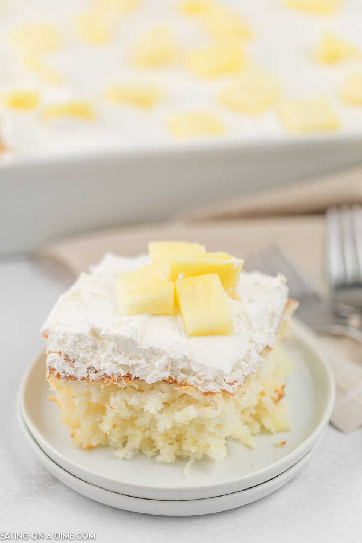 pineapple angel food cake topped with cool whip and pineapple