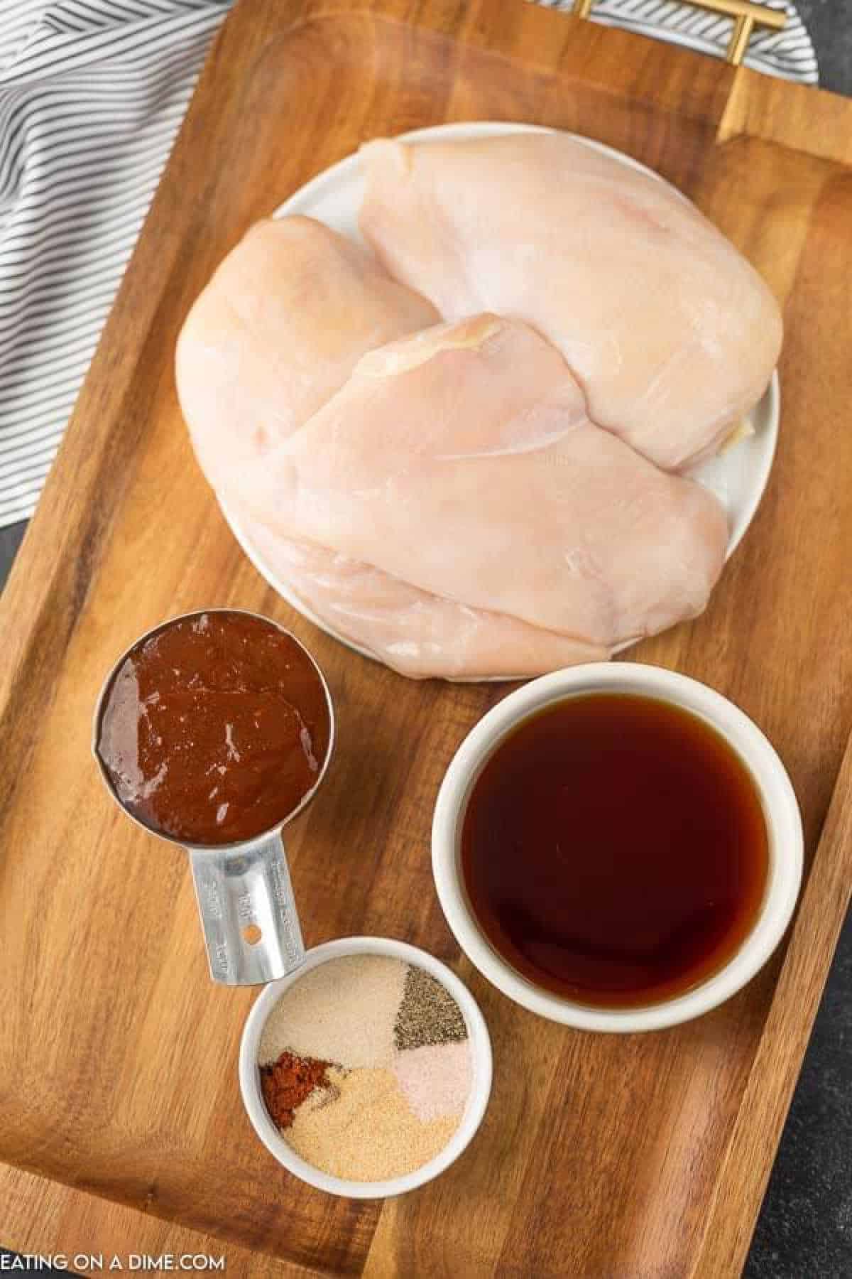 Ingredients to make Root Beer BBQ Chicken - chicken breast, onion powder, garlic powder, chili powder, salt and pepper, root beer, BBQ Sauce