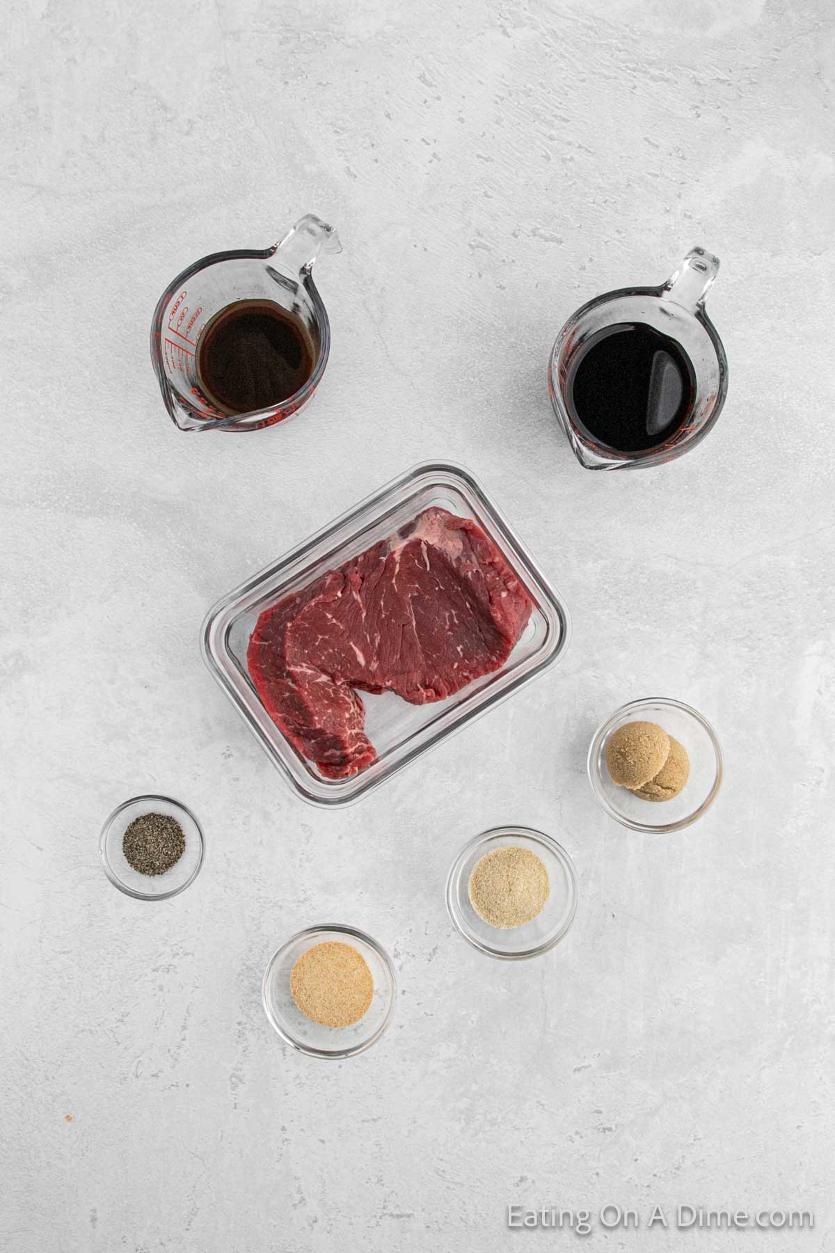 Ingredients - beef steak, soy sauce, worcestershire sauce, brown sugar, brown sugar, garlic powder, onion, powder, pepper