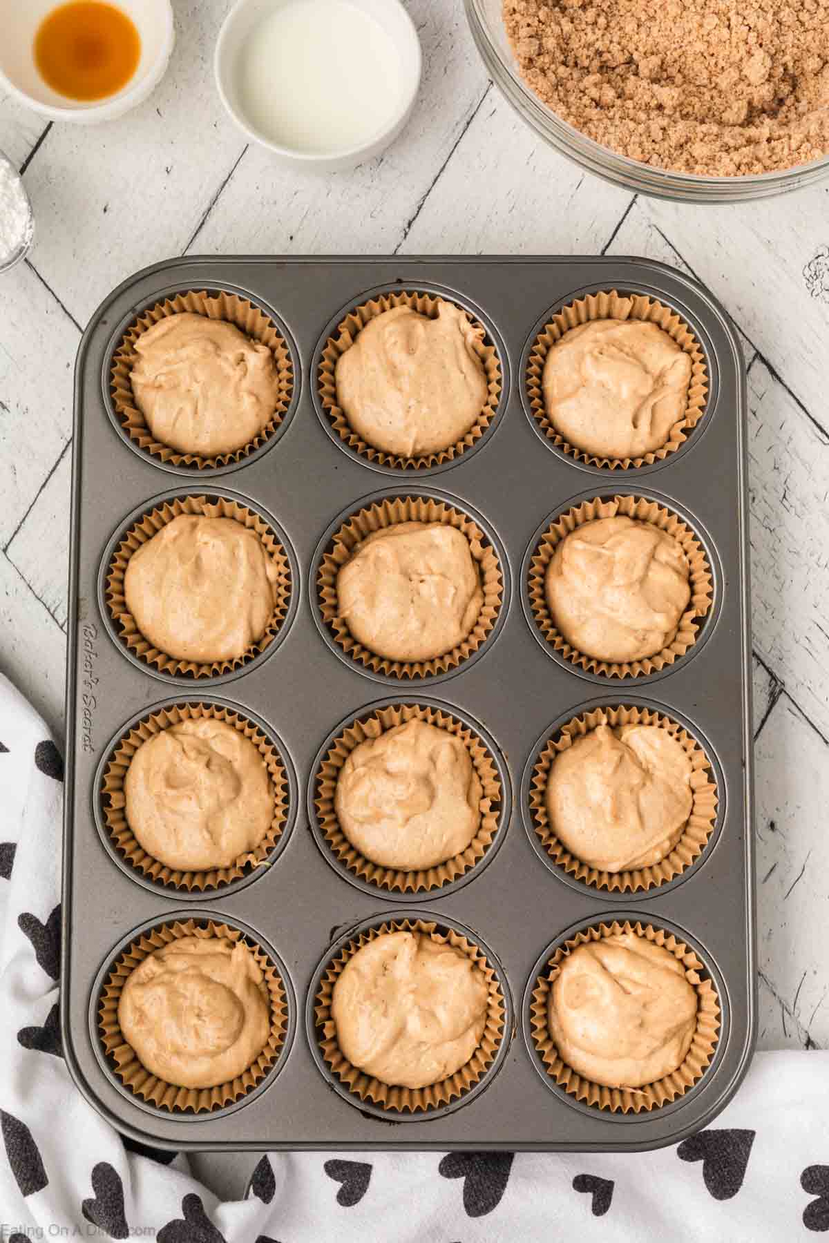 Dividing the muffin batter into the muffin pan