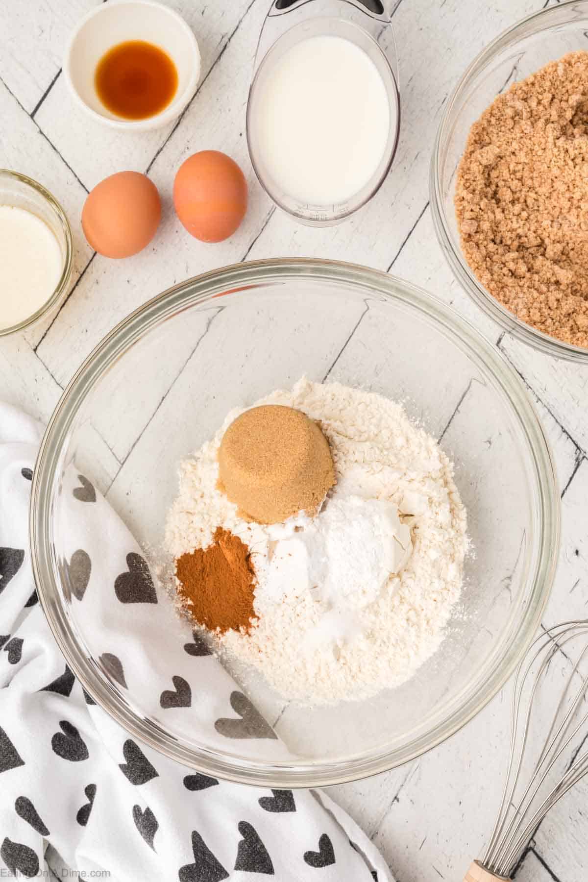 Flour, brown sugar, baking powder, baking soda and cinnamon and salt in a bowl