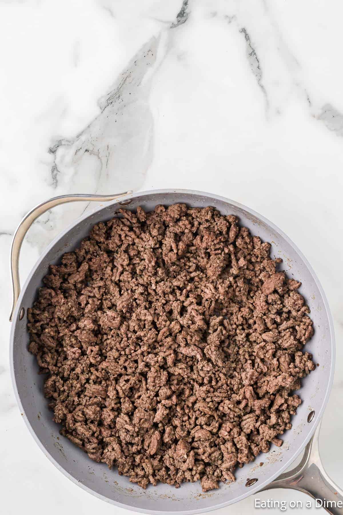 Browned ground beef in a skillet