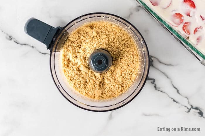 Crushing remaining cookies in the food processor