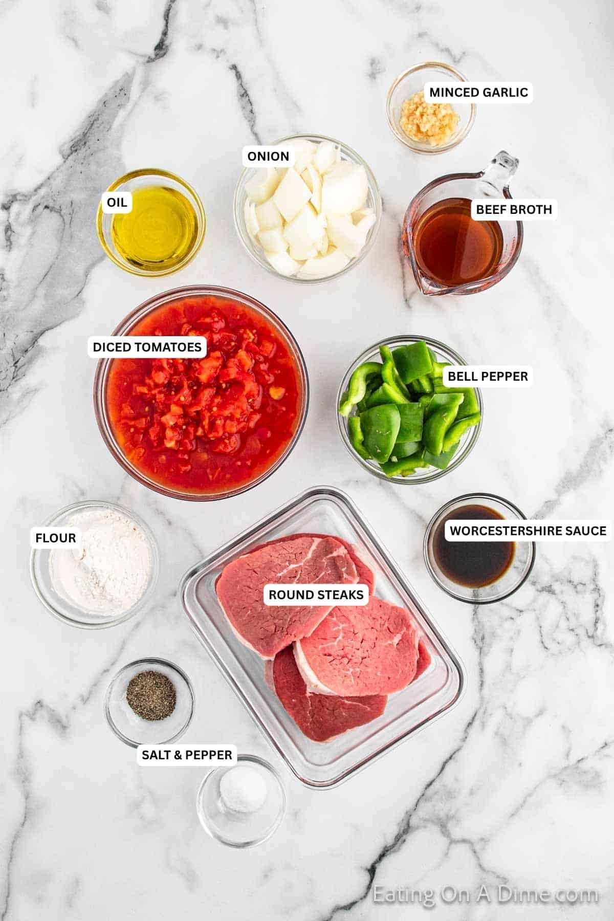 Ingredients for recipe: minced garlic, onion, oil, beef broth, diced tomatoes, bell pepper, flour, round steaks, Worcestershire sauce, salt and pepper.