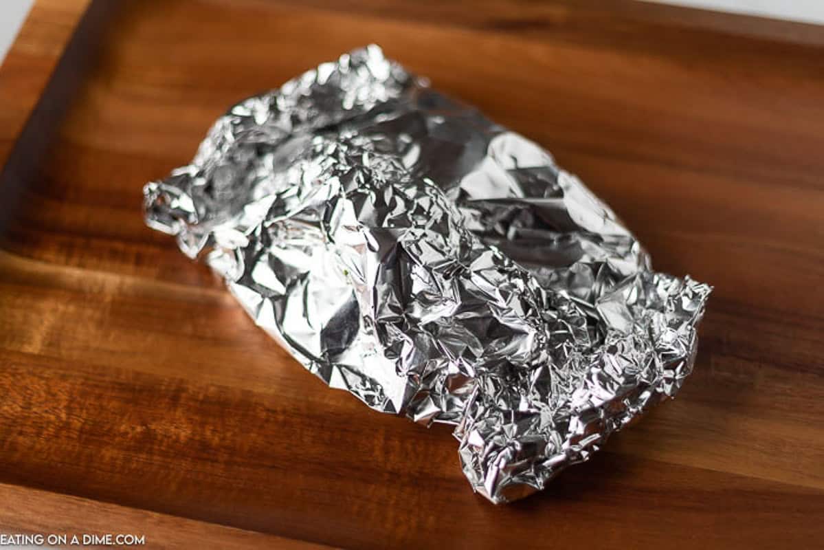 Foil packet on a serving platter 