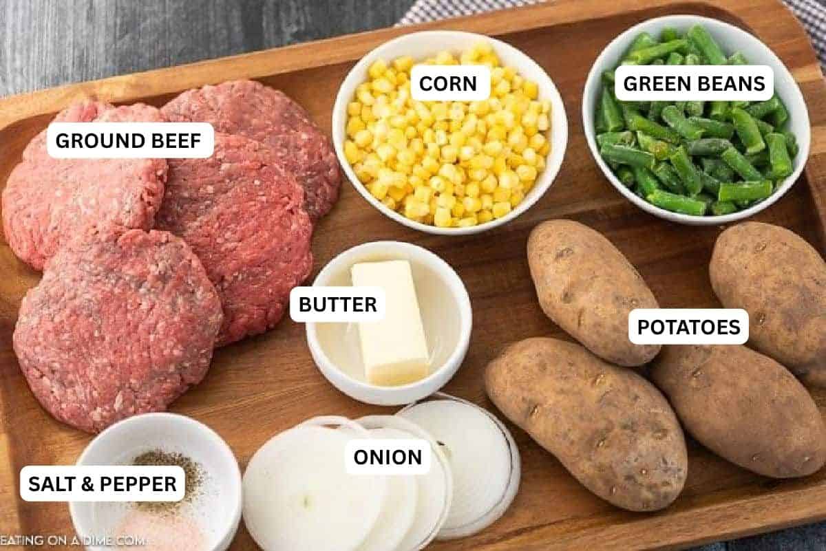 We love this simple Hobo Dinner Foil Packet Meal for the grill and campfires. It is the best hobo dinner recipe for Summer dinners and warm nights. Such an easy grilling recipe! Ingredients for recipe: salt, pepper, onion, potatoes, butter, green beans, corn, ground beef.