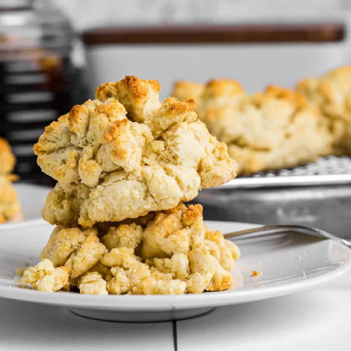 Biscuits stacked on a white plate