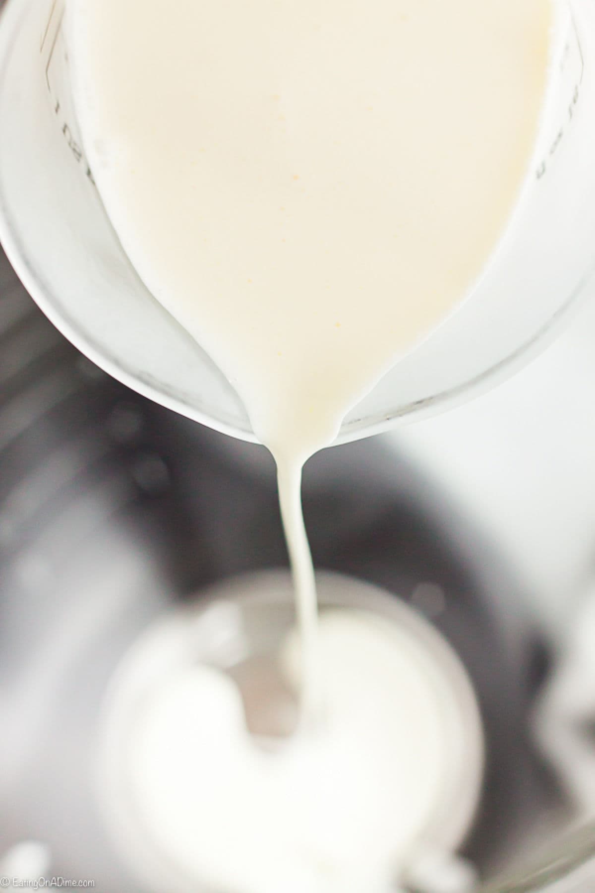 Pouring the cream in a bowl