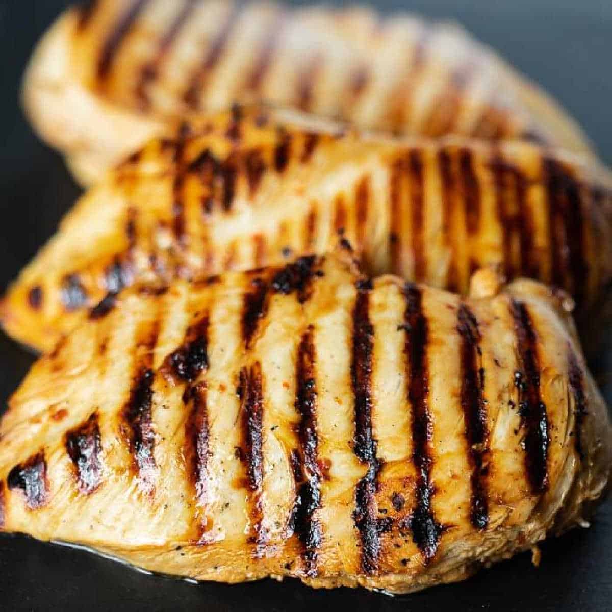 You are going to love this 2 ingredient chicken marinade that is perfect for grilled or baked chicken. This Italian Soy Sauce Marinade is easy to make and packed with flavor. This is definitely of the best chicken marinades! #eatingonadime #marinaderecipes #grillingrecipes 