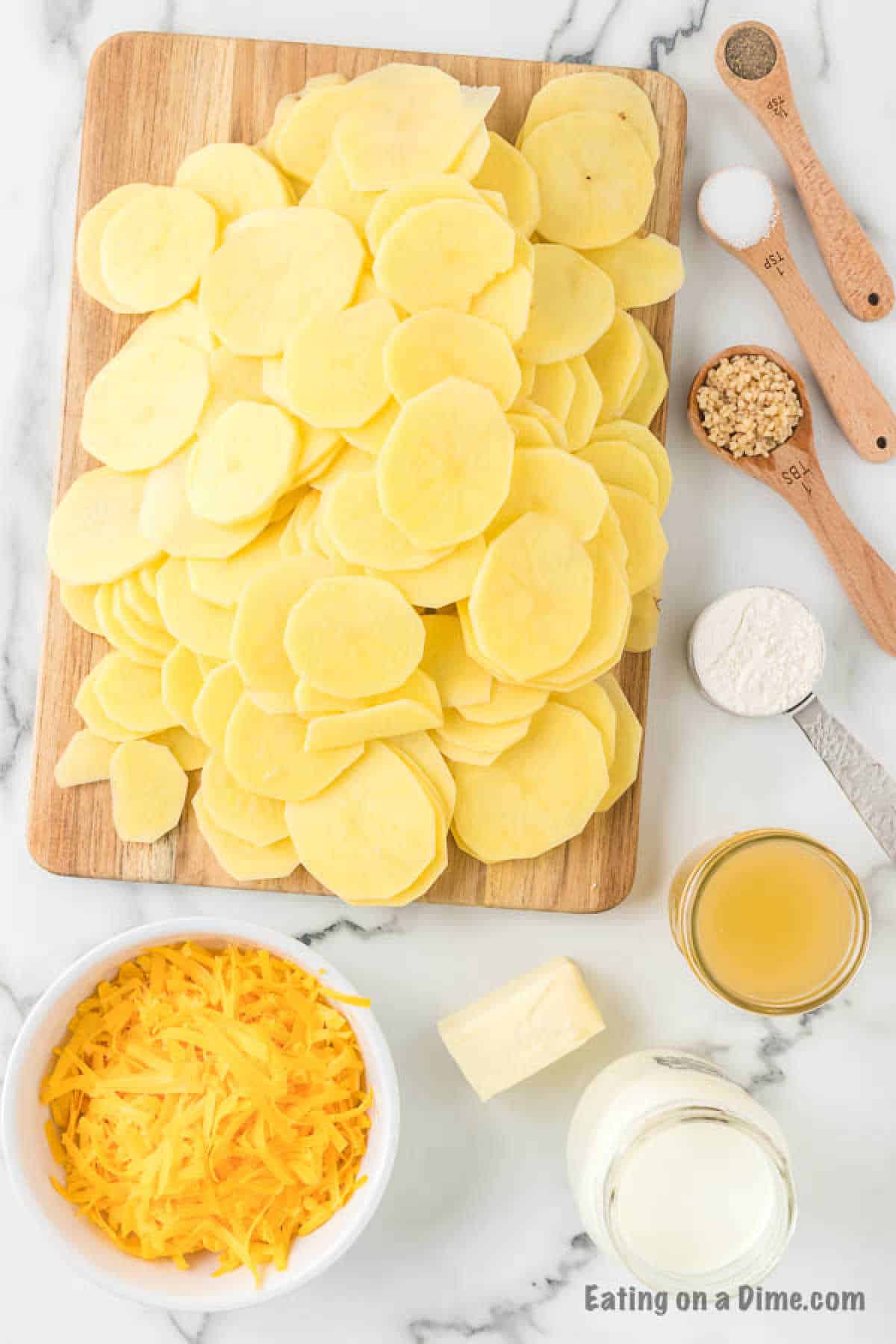 Ingredients - potatoes, butter, flour, milk, chicken broth, salt, pepper, minced garlic, cheddar cheese